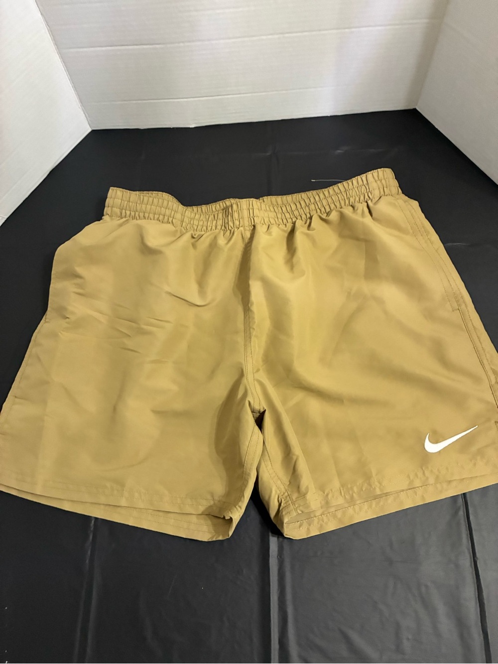 Nike Tan Athletic Shorts with White Swoosh